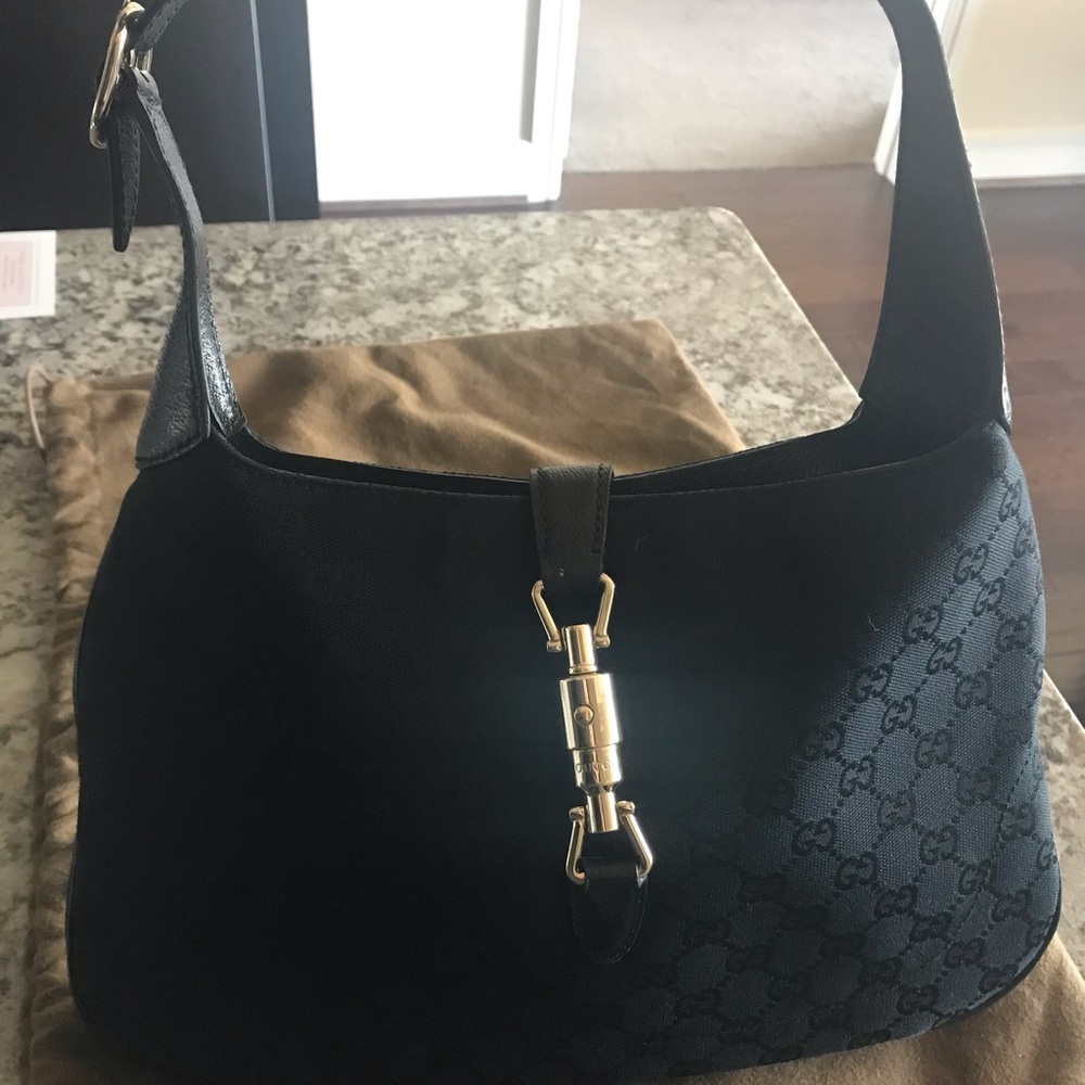 Gucci- small  monogrammed hobo-black